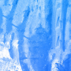 Blue watercolor paint background.