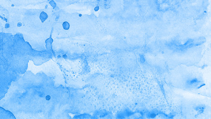 Blue watercolor paint background.