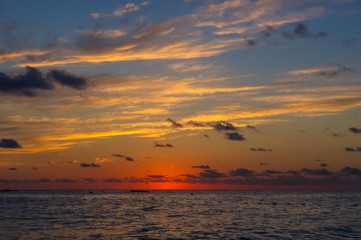 Amazing sea sunset, the sun, waves, clouds