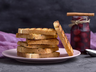 square pieces of white wheat flour in a ceramic pink plate