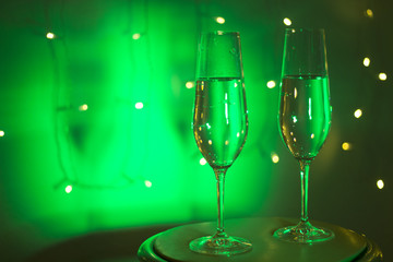 Champagne glass in disco party bar
