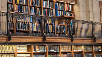 Library shelves with many books