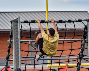 Athletes competing on an obstacle course