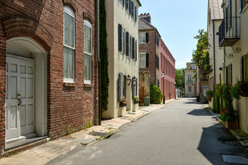 Fototapeta na wymiar Old Street - Summer view of an old street at Downtown Charleston, South Carolina, USA.