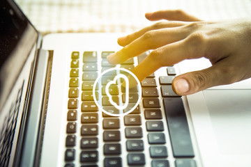 Young woman using laptop computer.  businessman hand working with modern technology and digital layer effect as business strategy concept