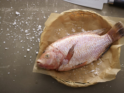 Tilapia fish in a basket