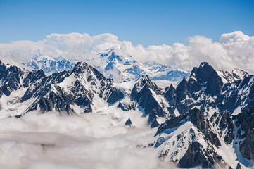 Close-up of snowy peaks and mountains, viewed from the Aiguille du Midi, near Chamonix. A famous ski resort located in Haute-Savoie Province, at the foot of Mont Blanc in the French Alps.