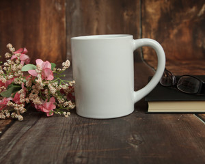 Blank white mug mockup photo with rustic wood background