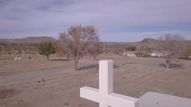 Drone Fly over Cross cemetery desert