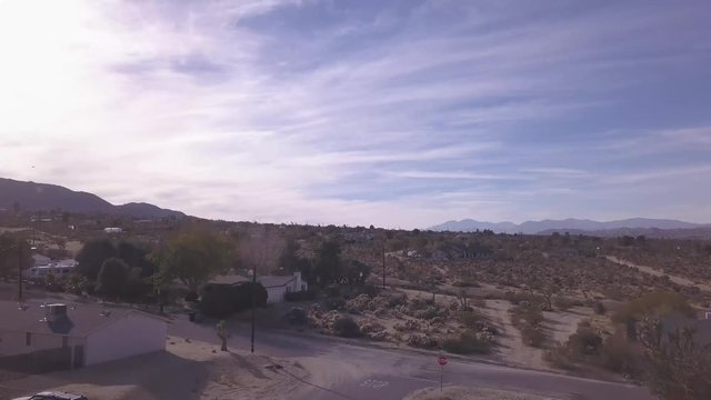 Desert Joshua Tree neighborhood fly over