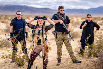 In a post-apocalyptic desert wasteland, a Queen of the Apocalypse leads her militia against the...