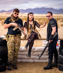 In a post-apocalyptic desert wasteland, a Queen of the Apocalypse leads her militia against the...