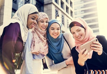 Group of islamic women taking selfie together