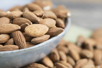 Close up of Almonds in Blue Bowl