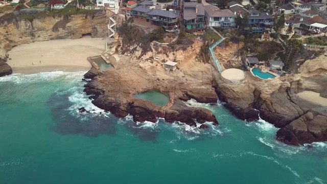 Natural Rock pools beach panning drone shot