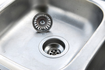 water drain into stainless steel sink