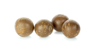 Macadamia nut on white background.