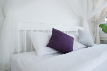 Fototapeta na wymiar pillows on white bed