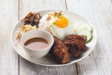 malaysian fried chicken rice with anchovies and egg