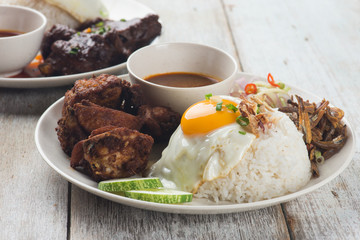 malaysian fried chicken rice with anchovies and egg