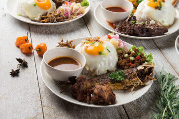 fried chicken and fried fish rice with curry