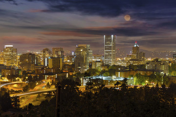 Fototapeta na wymiar Full Moon Rising over Downtown Portland