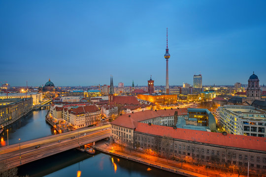 Aerial view of Berlin at night: Spree river, museum island, alexanderplatz and tv tower, Germany