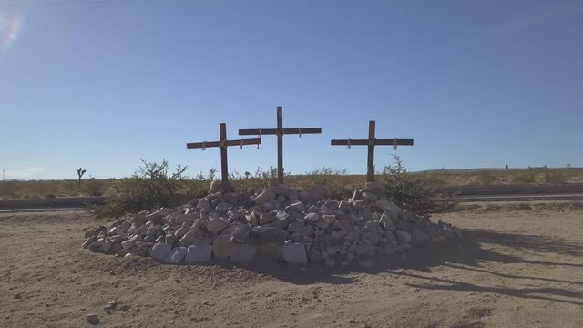 Wooden Crosses Dolly out drone in the desert