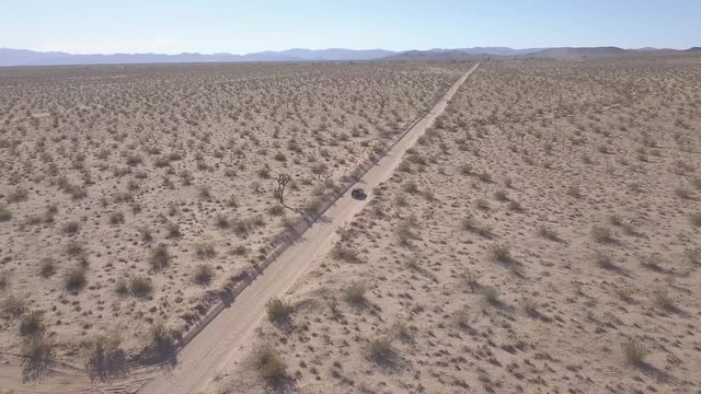 Desert Dirt road drone tracking