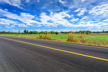 Asphalt road side view and landscape countryside.