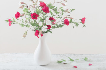 summer flowers in white vase