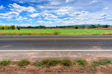 Asphalt road side view and landscape countryside.