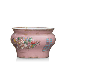 Di cut Ancient pink metal pot with flower print on white background,copy space