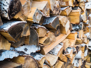 dry chopped firewood logs ready for winter