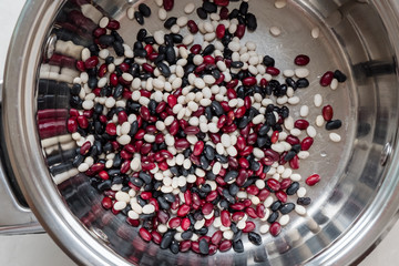 Colored beans in a saucepan