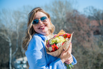 Happy smiling fashionable plus size young woman in modern city life. Life of xl lady. Concept of positive lifestyle. Pretty stylish girl at city center 