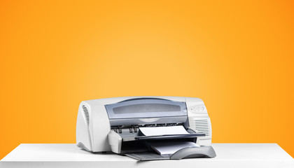 Fototapeta premium Printer copier machine on a bright colored background