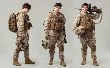 Soldier in camouflage holding rifle