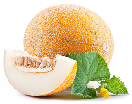 Ripe melons with fresh melon leaves on white background.