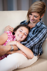 Close up portrait of happy family. Mother and daughter