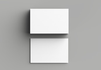 Business card mock up isolated on gray background. Horizontal. 3D illustrating.