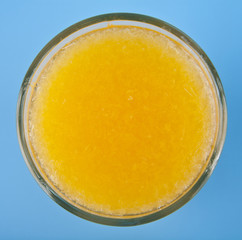orange juice on a blue background
