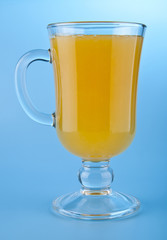 orange juice on a blue background