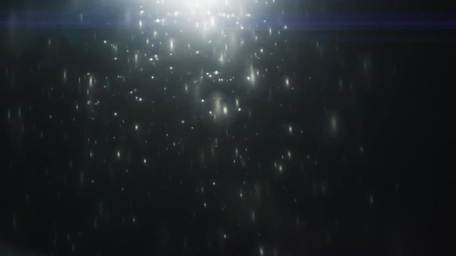Defocused, Bokeh Particles Chaotically Flying in the Light on the Black Background. Anamorphic Real Lens Flare that is Easy to Use in Blend / Overlay Modes.