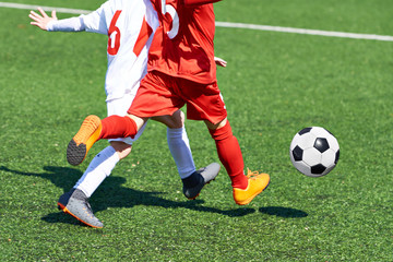 Child football players and ball