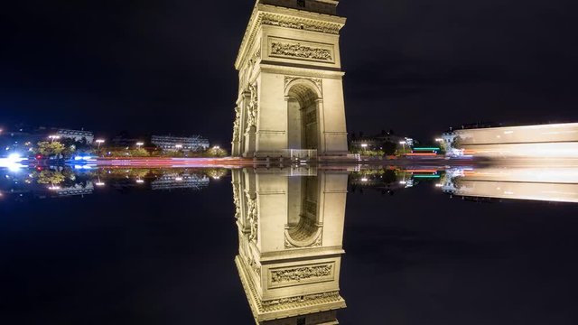 4K Time Lapse of Arc de Triomphe at night, Paris with mystic reflection
