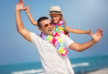 Summer, family, vacation concept. Father with daughter having fun