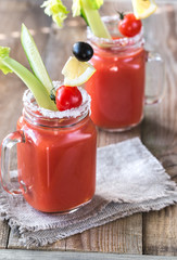 Tomato juice in the mason jars