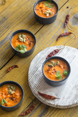 Bowls of pumpkin cream soup