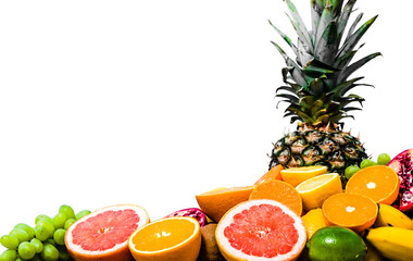 Tropical fruits on white background, pile of fresh fruit assortment